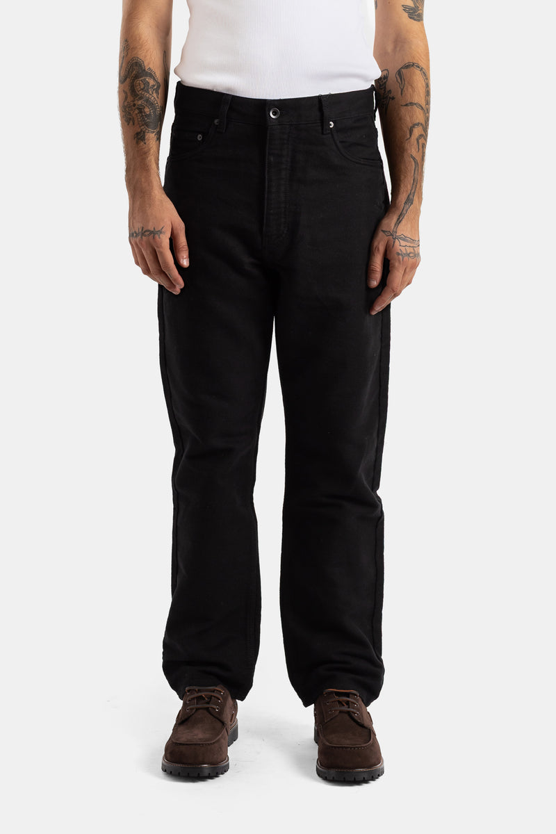 Studio Nicholson men's loose 90s straight-leg five-pocket jeans made of a dense and deep black denim.