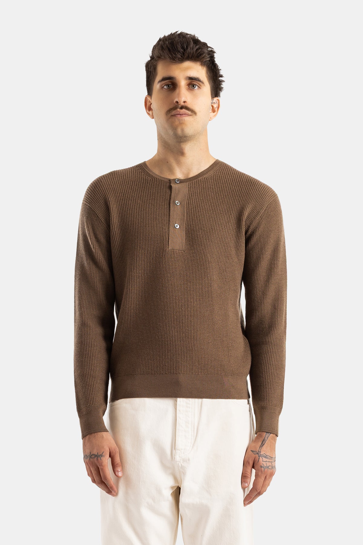 Studio Nicholson long-sleeve waffle-knit henley sweater in a tobacco brown shade with a buttoned collar.
