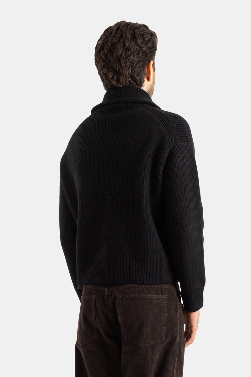 Studio Nicholson cardigan noir côtelé dos homme, col châle structuré et coutures raglan visibles