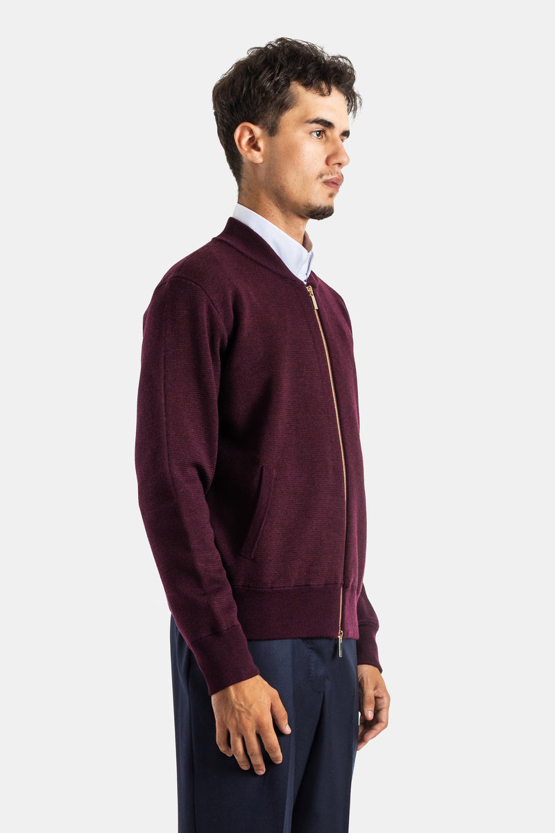 Thom Browne bombers laine mérinos bordeaux vue de profil, zip doré contrasté et poche latérale intégrée