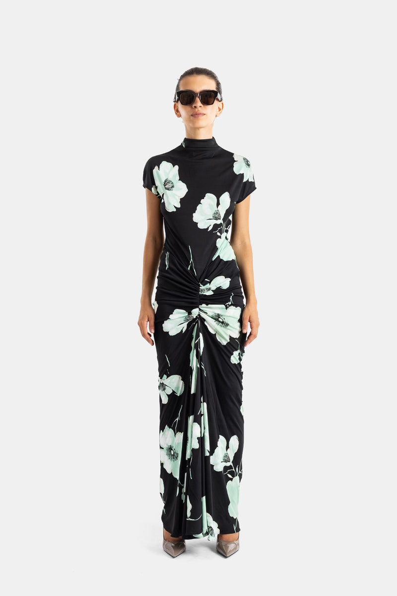 Maison Alaïa robe jersey drapée nœud central grandes fleurs vert menthe vue frontale mannequin