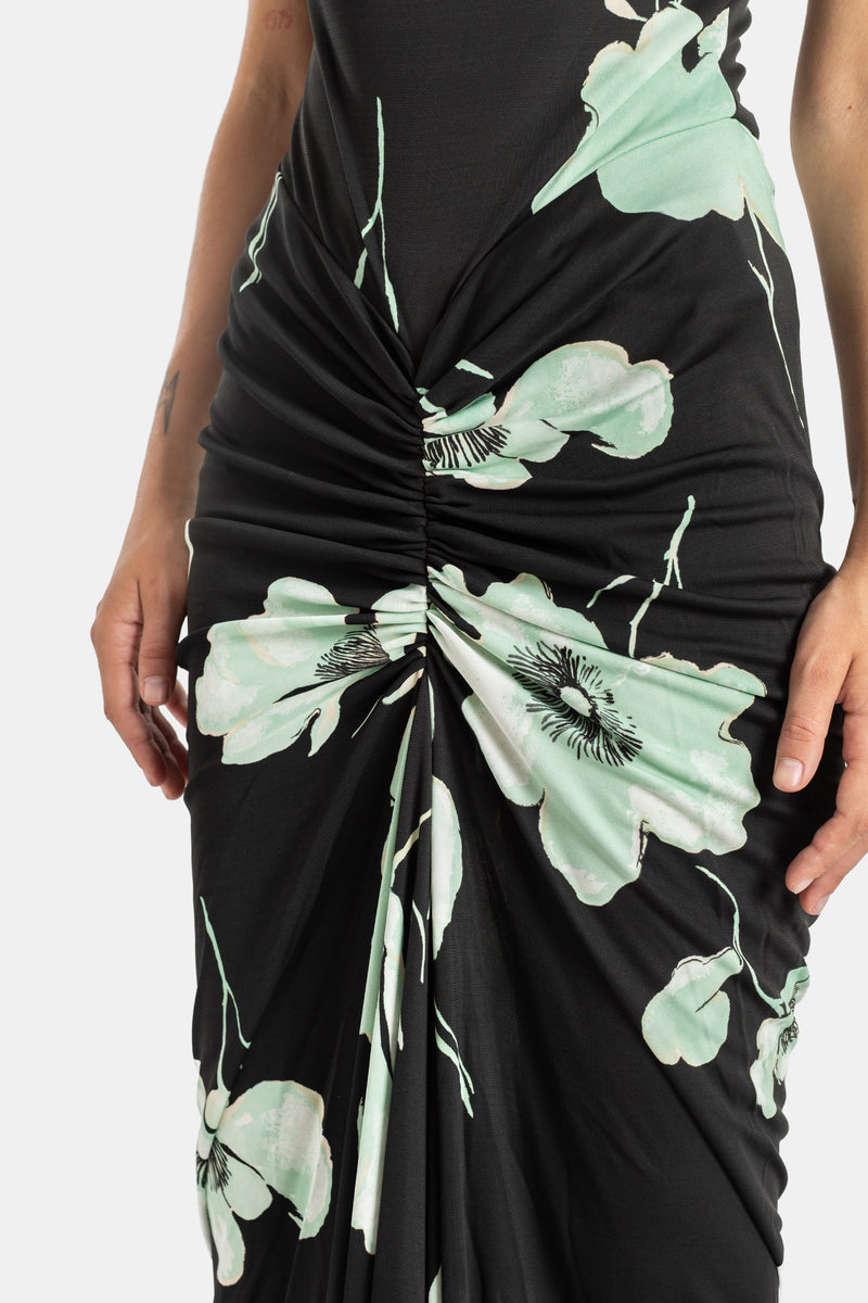Maison Alaïa détail fronces centrales robe jersey noir frisson drapé grandes fleurs vert menthe taille