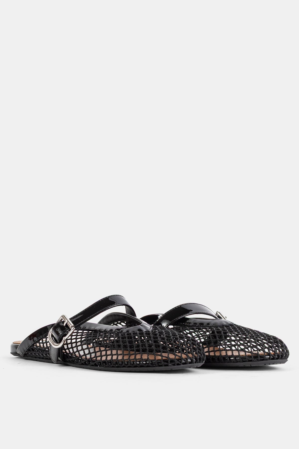 Mules plates en résille noire