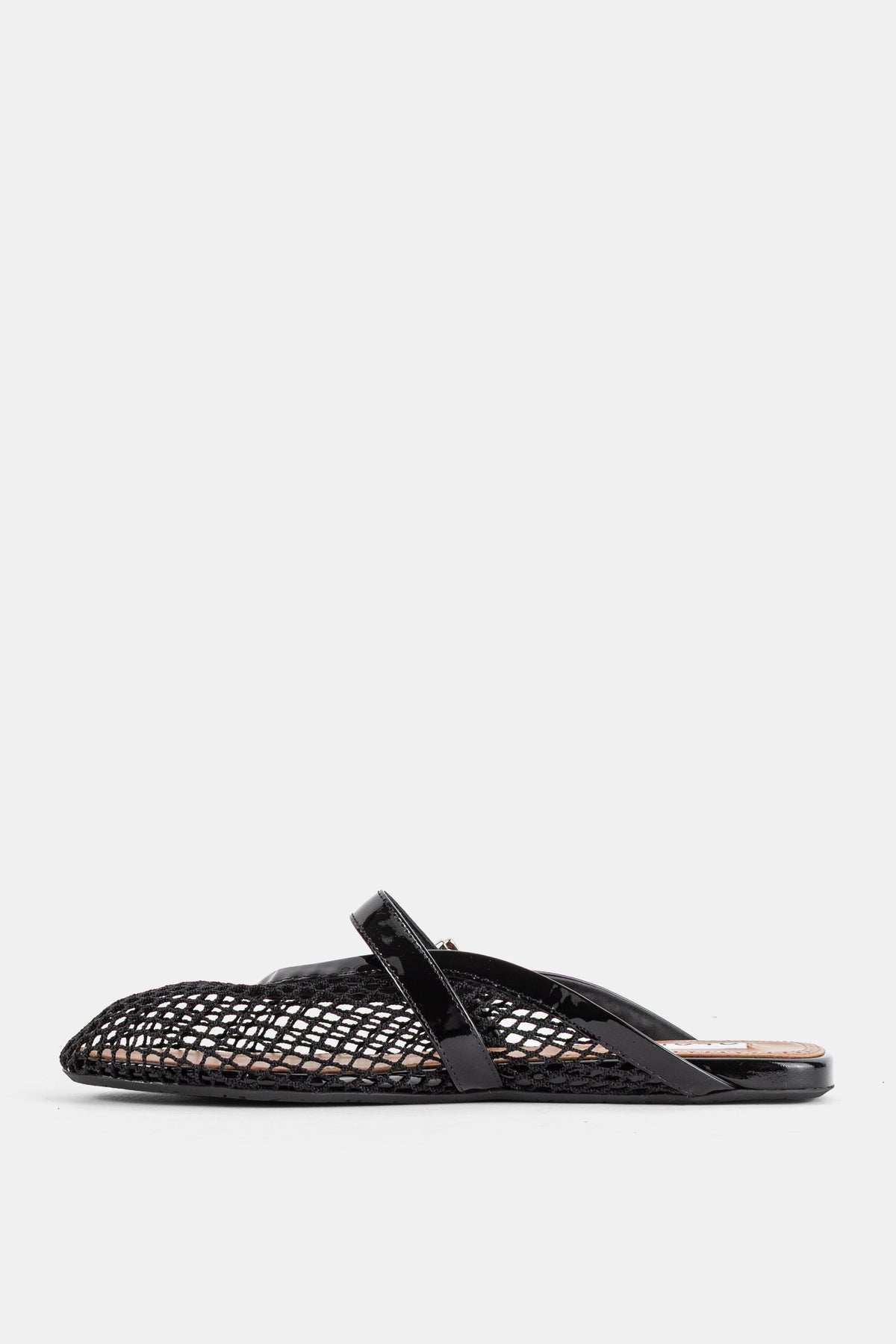 Mules plates en résille noire