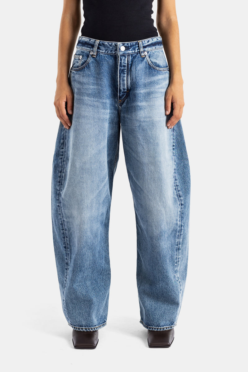 Maison Alaïa jean Rodeo coupe tonneau taille haute en denim vintage délavé bleu moyen