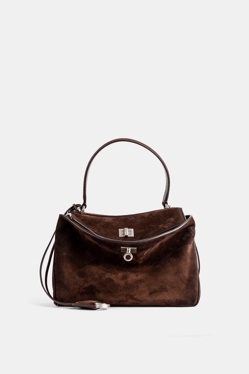 Mini mala de mão Balenciaga Rodeo S em camurça castanha, asa redonda rígida e fecho rotativo prateado.
