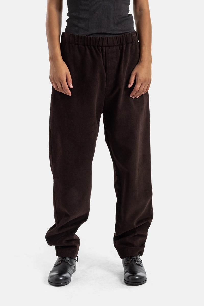 Casey Casey women's Jog Ah loose-fit trousers with an elasticated waist in dark brown corduroy fabric.