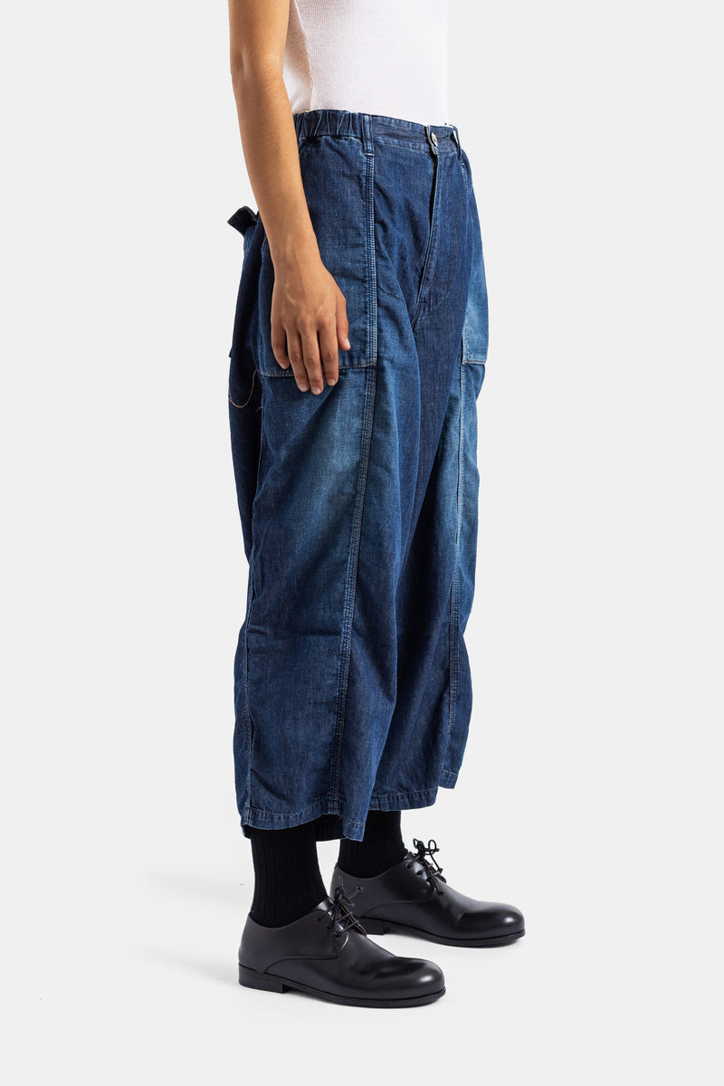 Cottle jean denim 8oz vue de profil silhouette oversize tombée, ceinture élastique et détails utilitaires latéraux