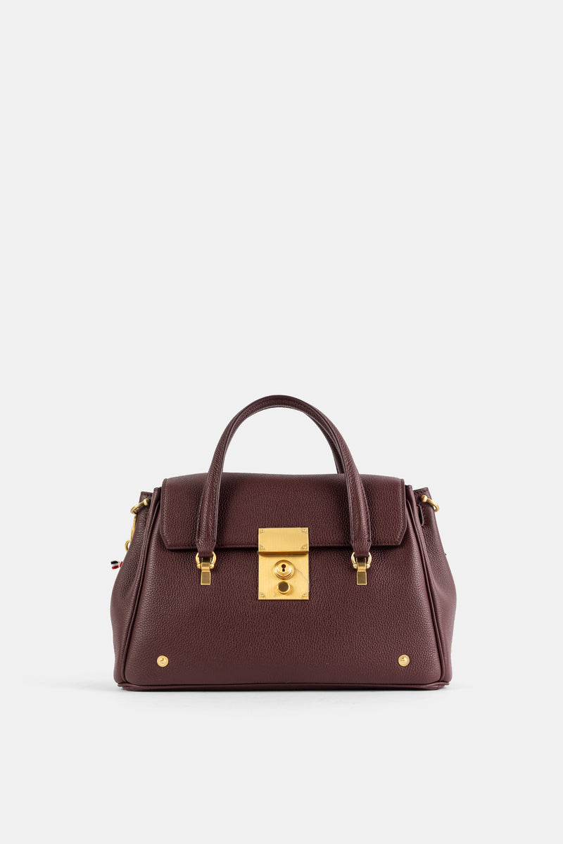 Thom Browne petit sac Bolton en cuir grainé souple bordeaux avec serrure dorée et poignée top handle