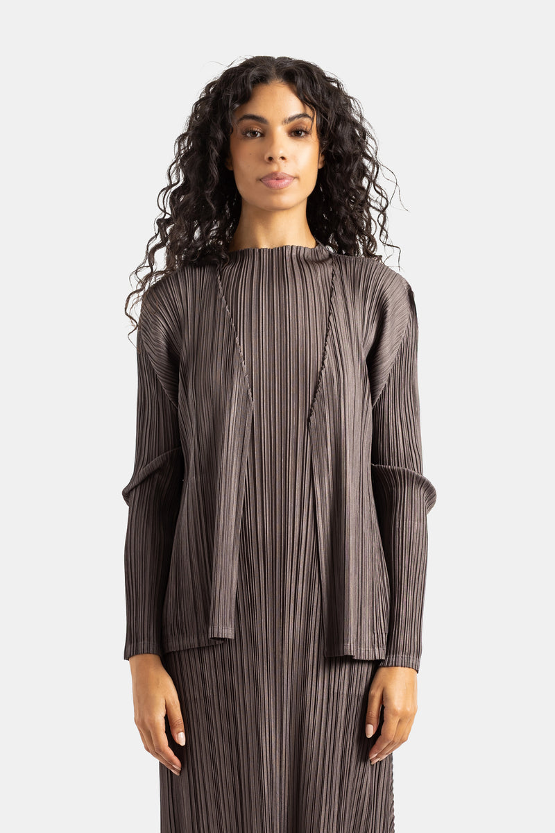 Cárdigan plisado Pleats Please Issey Miyake de cuello alto y manga larga en tono marrón taupe holgado.