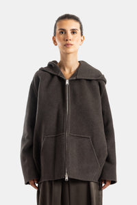 Khaite veste oversize à capuche en maille bouillie brun tabac avec fermeture éclair centrale et poches kangourou