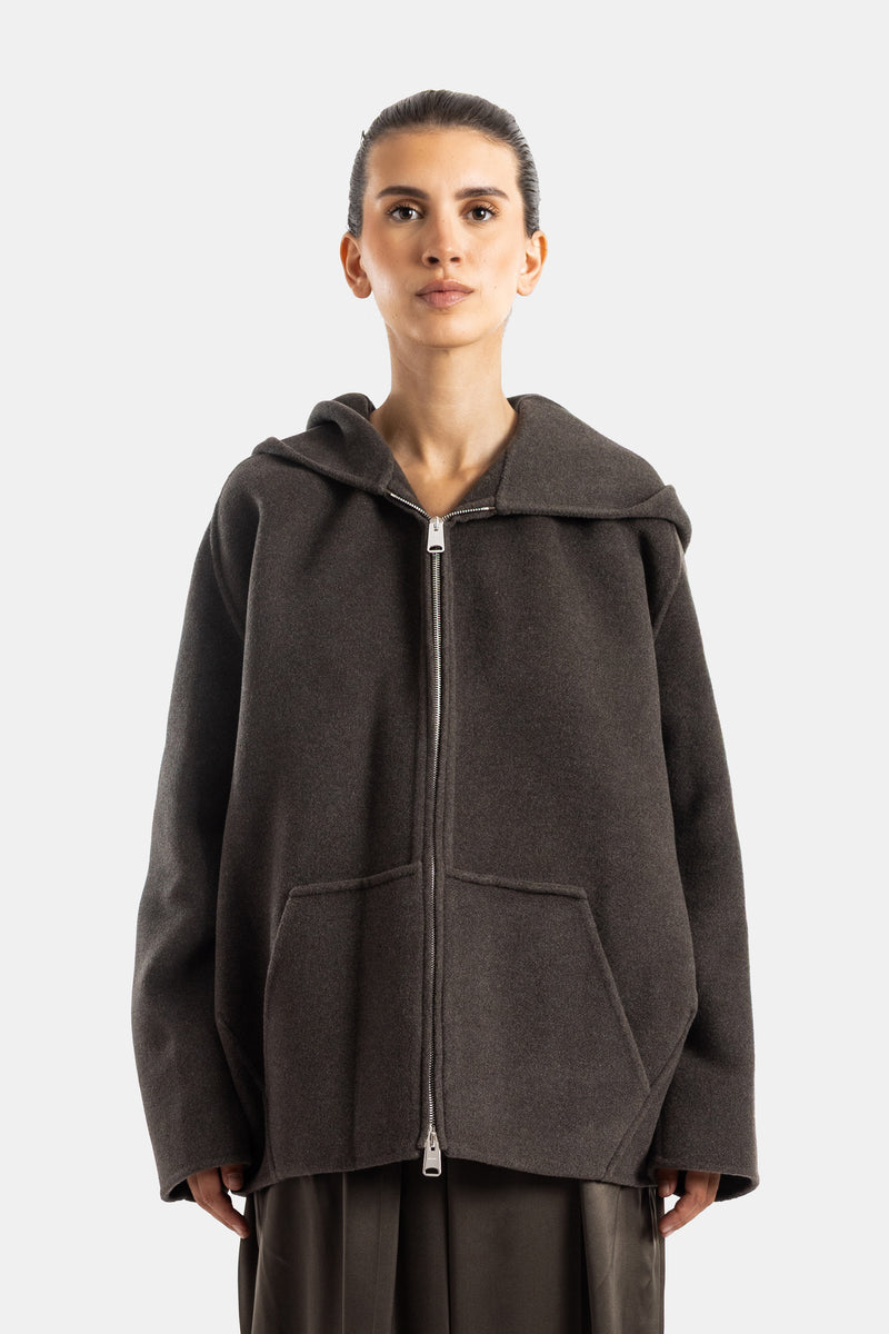 Khaite veste oversize à capuche en maille bouillie brun tabac avec fermeture éclair centrale et poches kangourou
