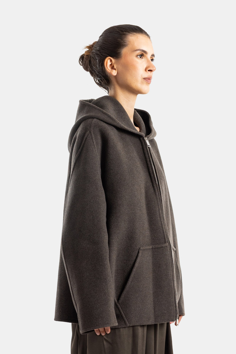 Khaite veste capuche profil femme, coupe ample structurée en laine kaki chiné, zippée argentée
