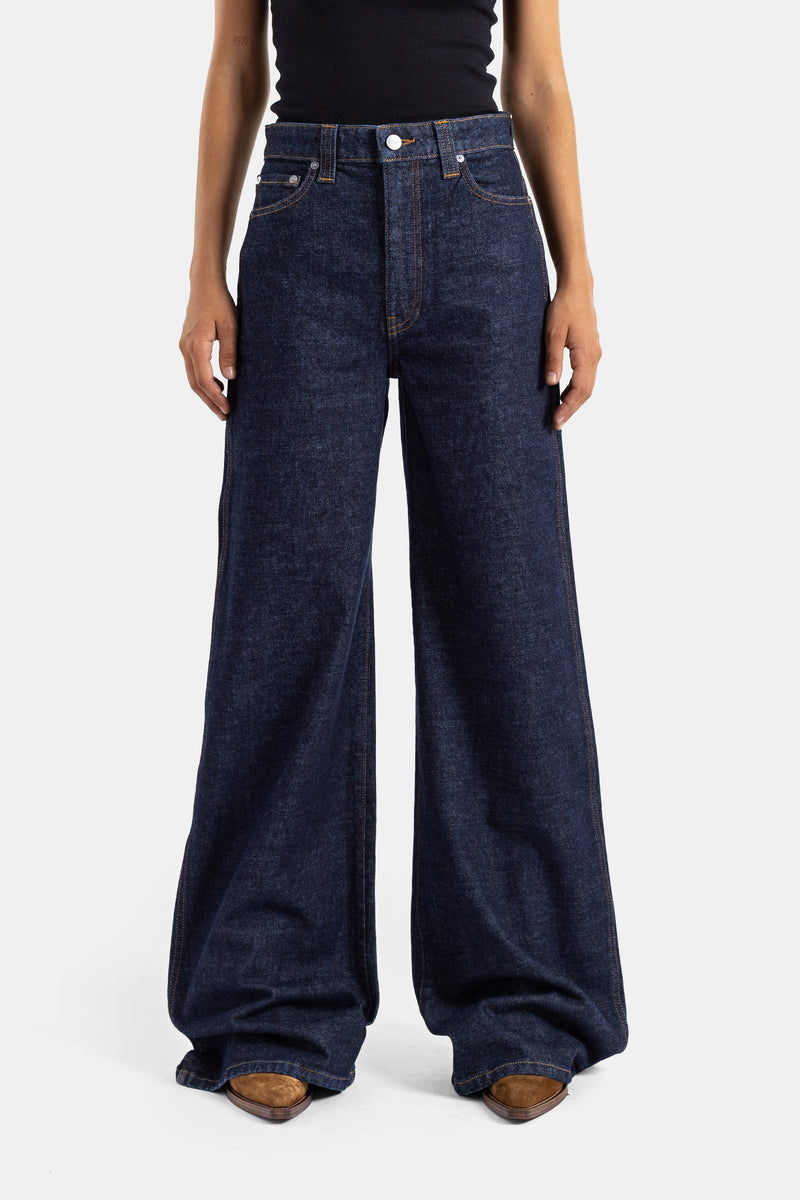 Khaite jean Dane coupe évasée taille haute en denim brut indigo non lavé pour femme