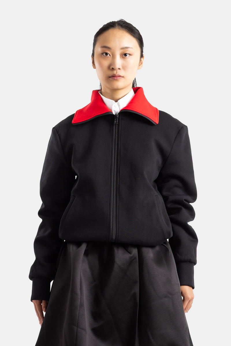 Blouson réversible zippé à col montant noir et rouge