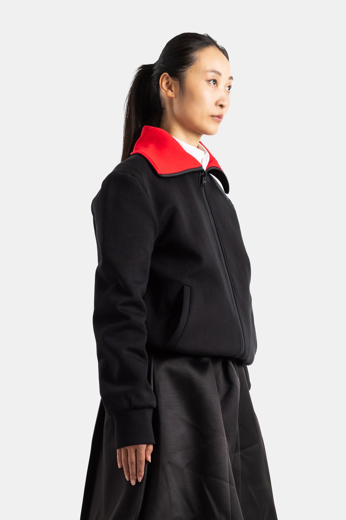 Blouson réversible zippé à col montant noir et rouge