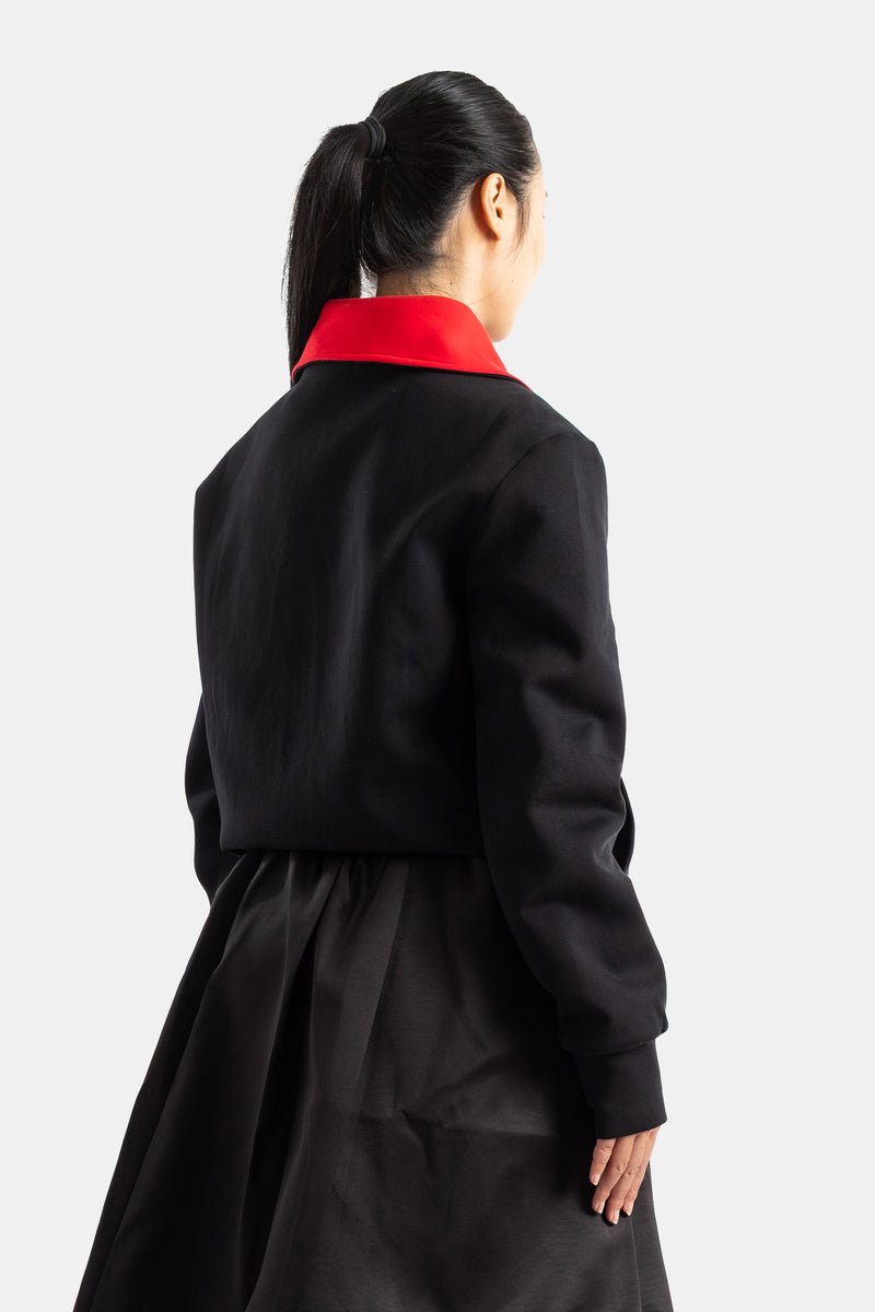 Blouson réversible zippé à col montant noir et rouge
