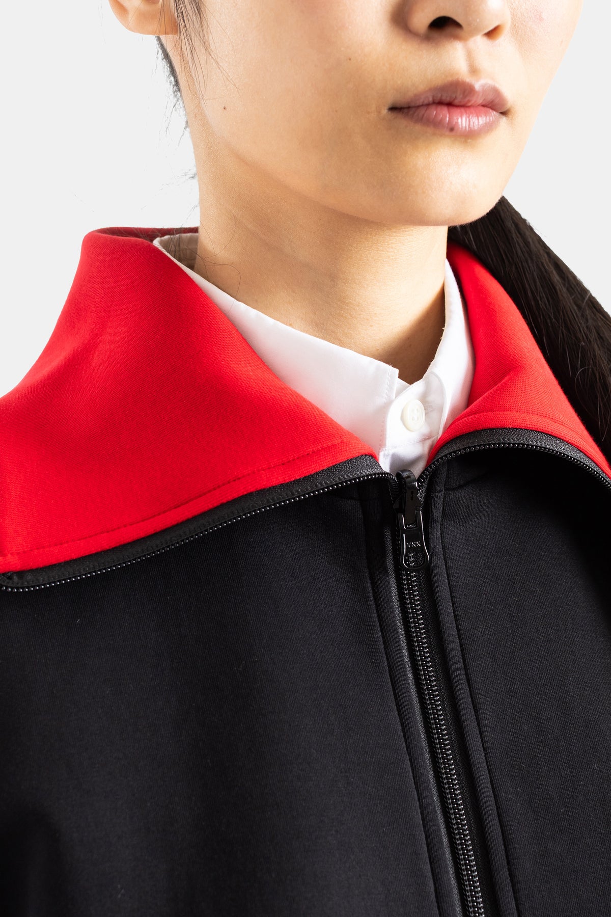 Blouson réversible zippé à col montant noir et rouge