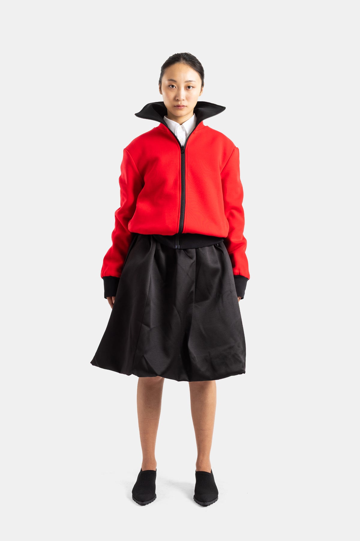 Blouson réversible zippé à col montant noir et rouge