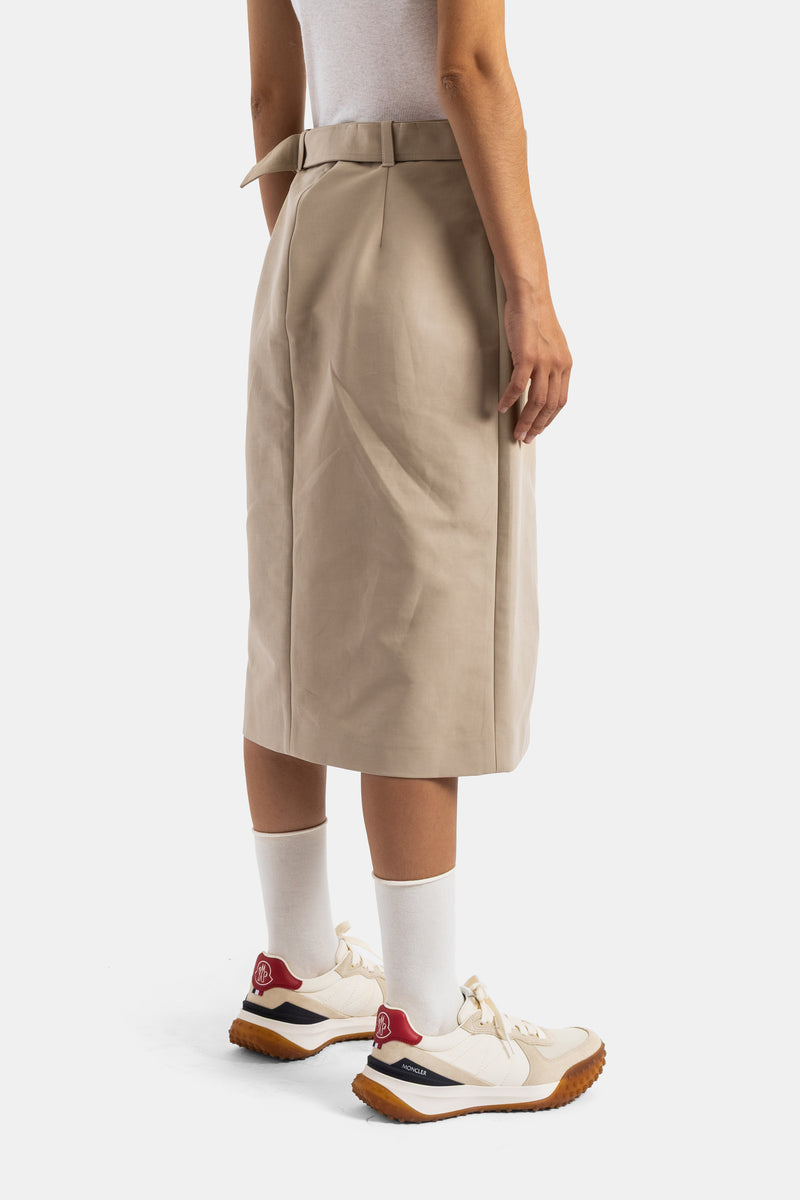 Moncler women's straight skirt three-quarter back view high-waisted belted sand beige fabric white sneakers