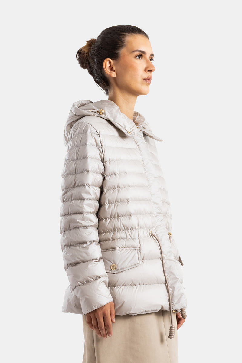 Moncler powder beige down jacket, side profile, cargo pockets, gold buttons, quilted sleeves, zip closure