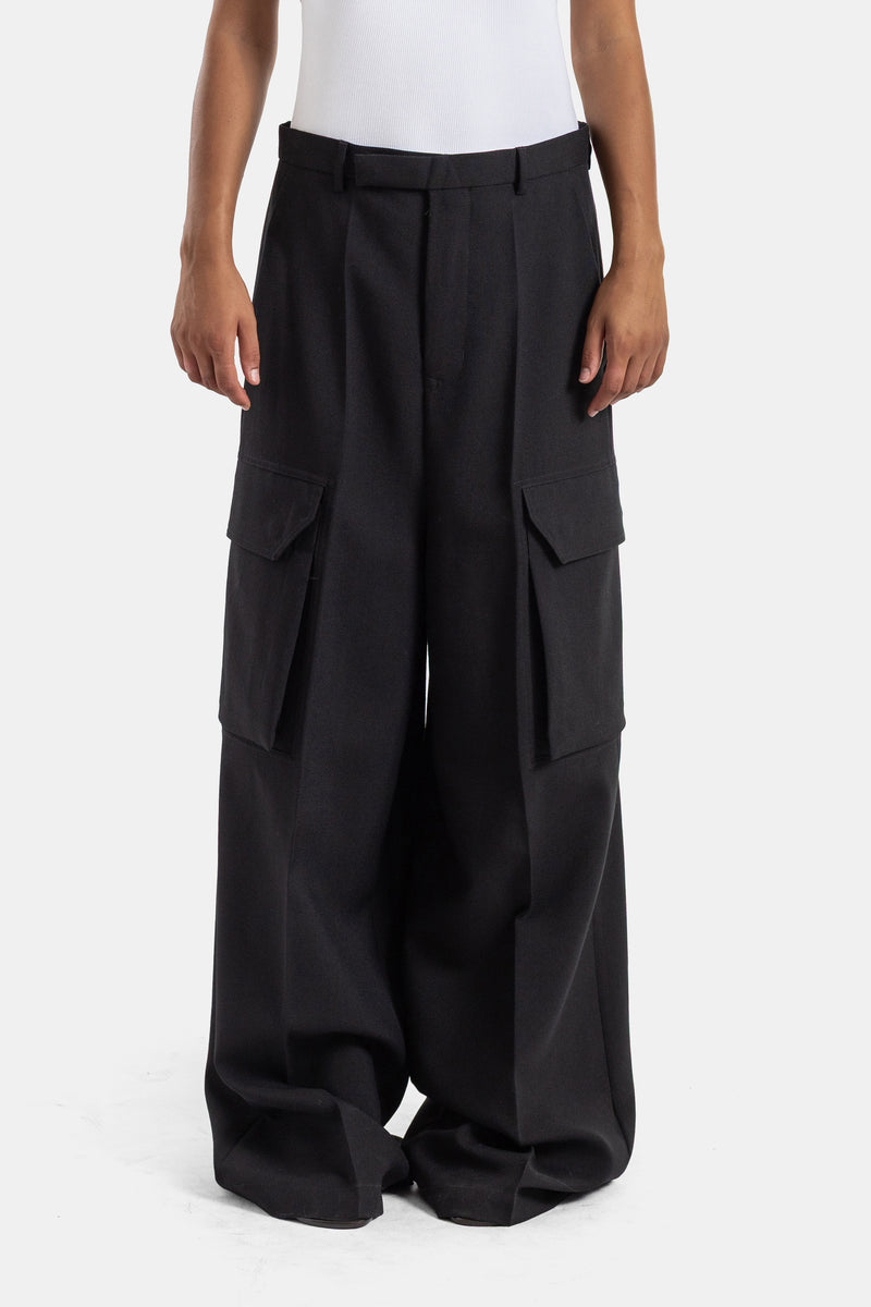 Rick Owens black high-rise wide-leg cargo trousers for women, featuring structured fabric and patch pockets