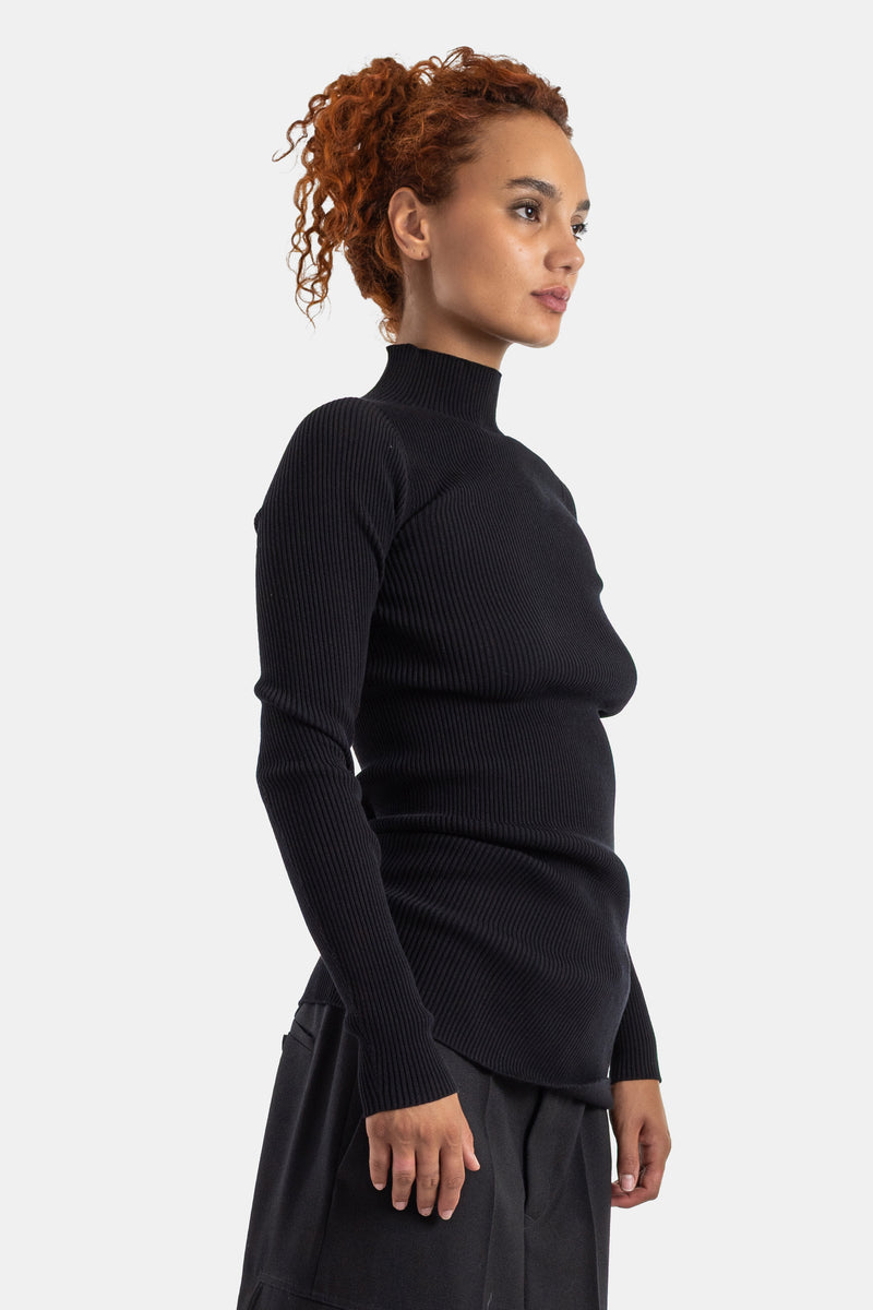 Rick Owens tricot côtelé col roulé noir vue de profil silhouette ajustée femme