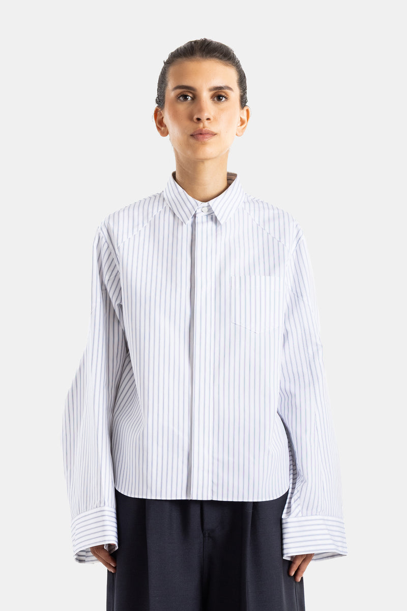 Sacai chemise oversized en popeline rayée blanc cassé bleu col classique manches larges femme