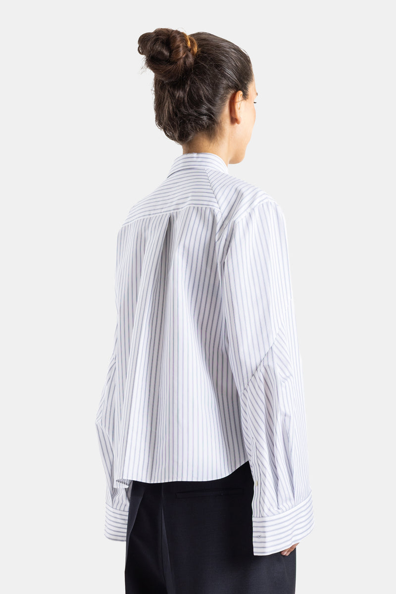 Sacai chemise popeline rayée dos vue arrière construction géométrique coutures diagonales femme