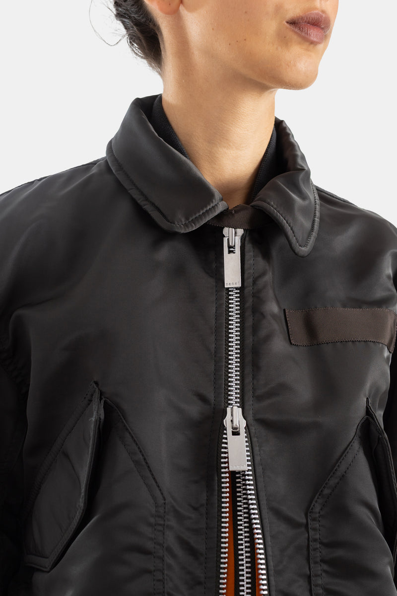Sacai blouson bomber fermeture double zip métal argenté col chemise matelassé nylon noir vue rapprochée femme