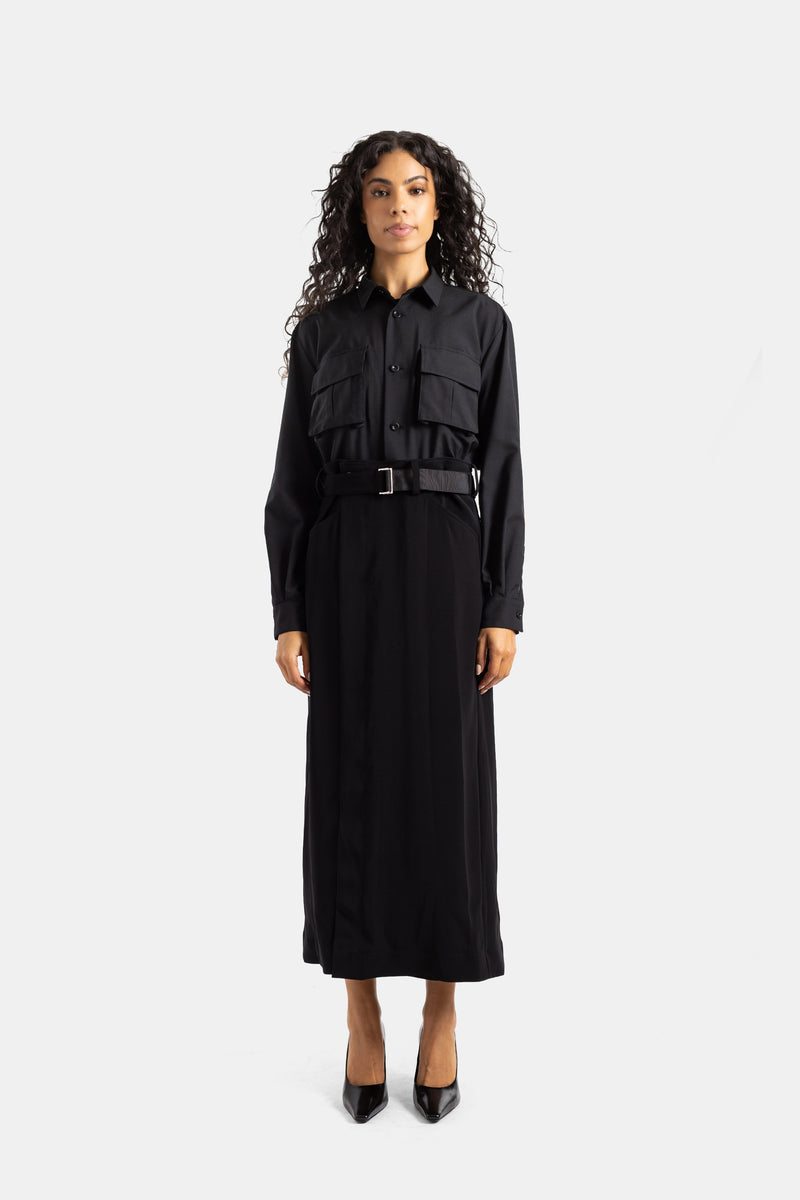 Sacai long black belted dress featuring a shirt collar, patch pockets, structured suiting and crepe back satin.