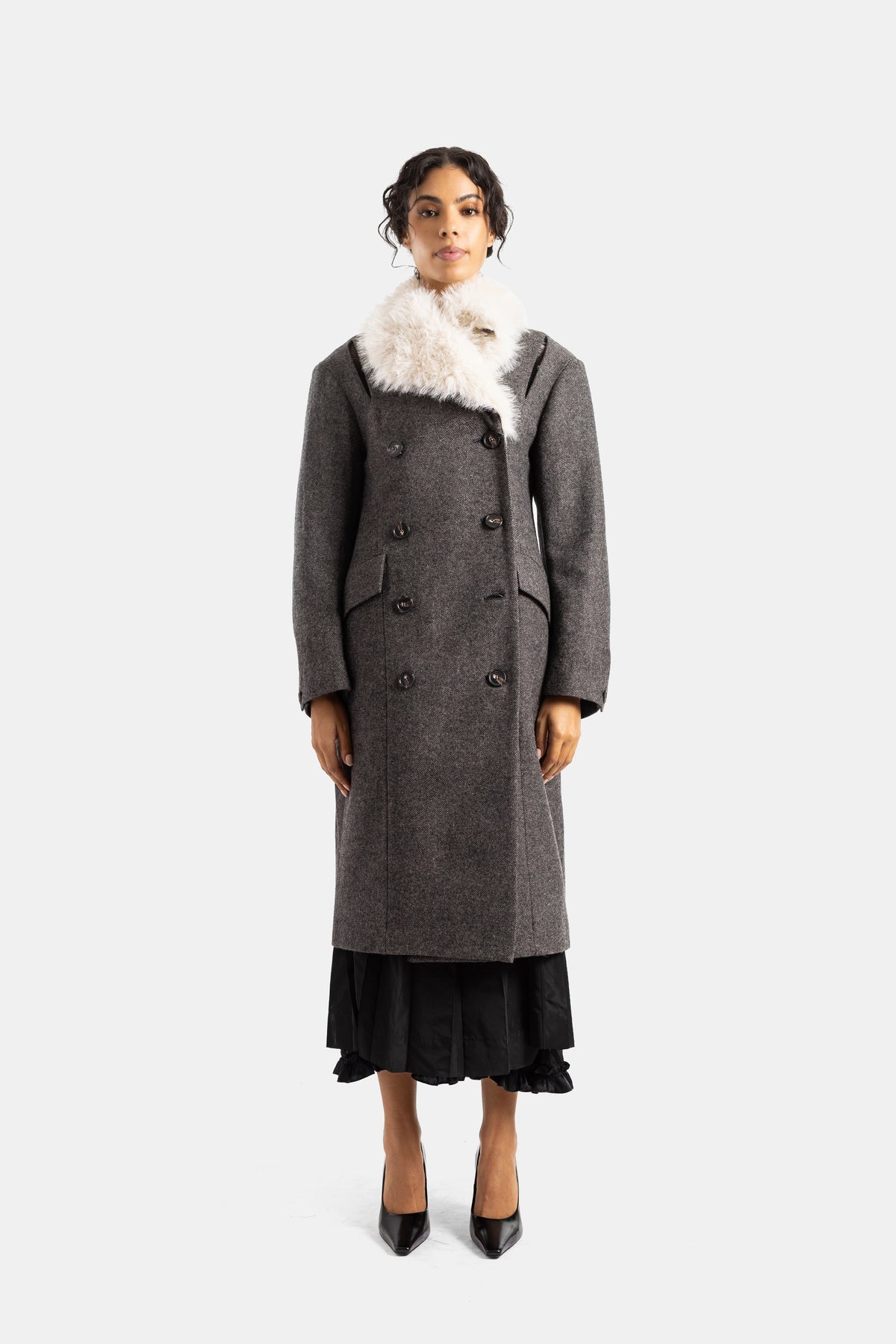 Simone Rocha women's double-breasted long coat in charcoal grey flecked wool featuring a white fur collar.