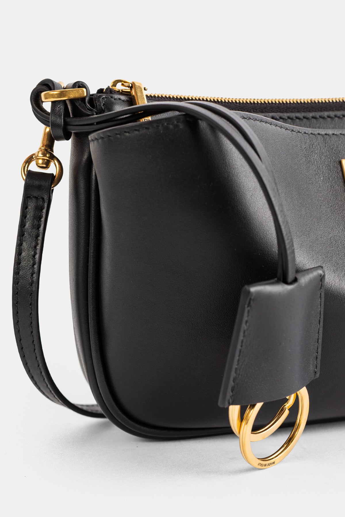 Pochette Rodeo Sling cuir lisse naturel noir