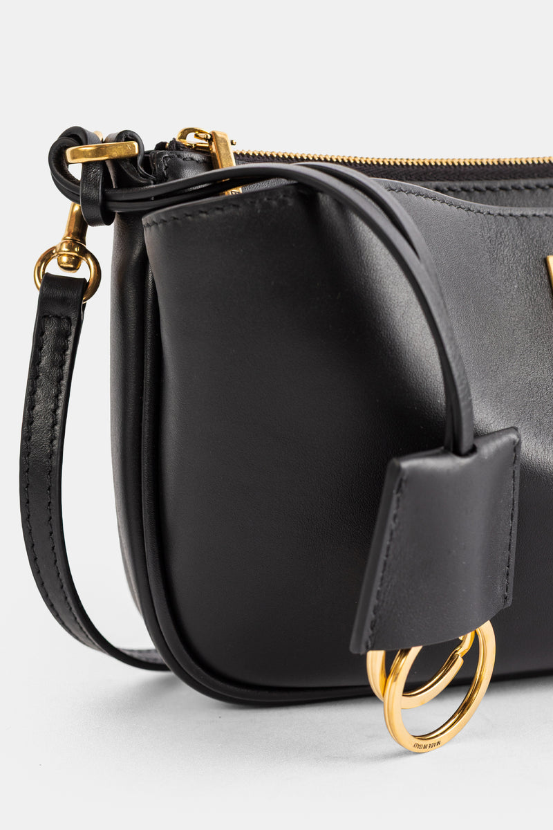 Pochette Rodeo Sling cuir lisse naturel noir