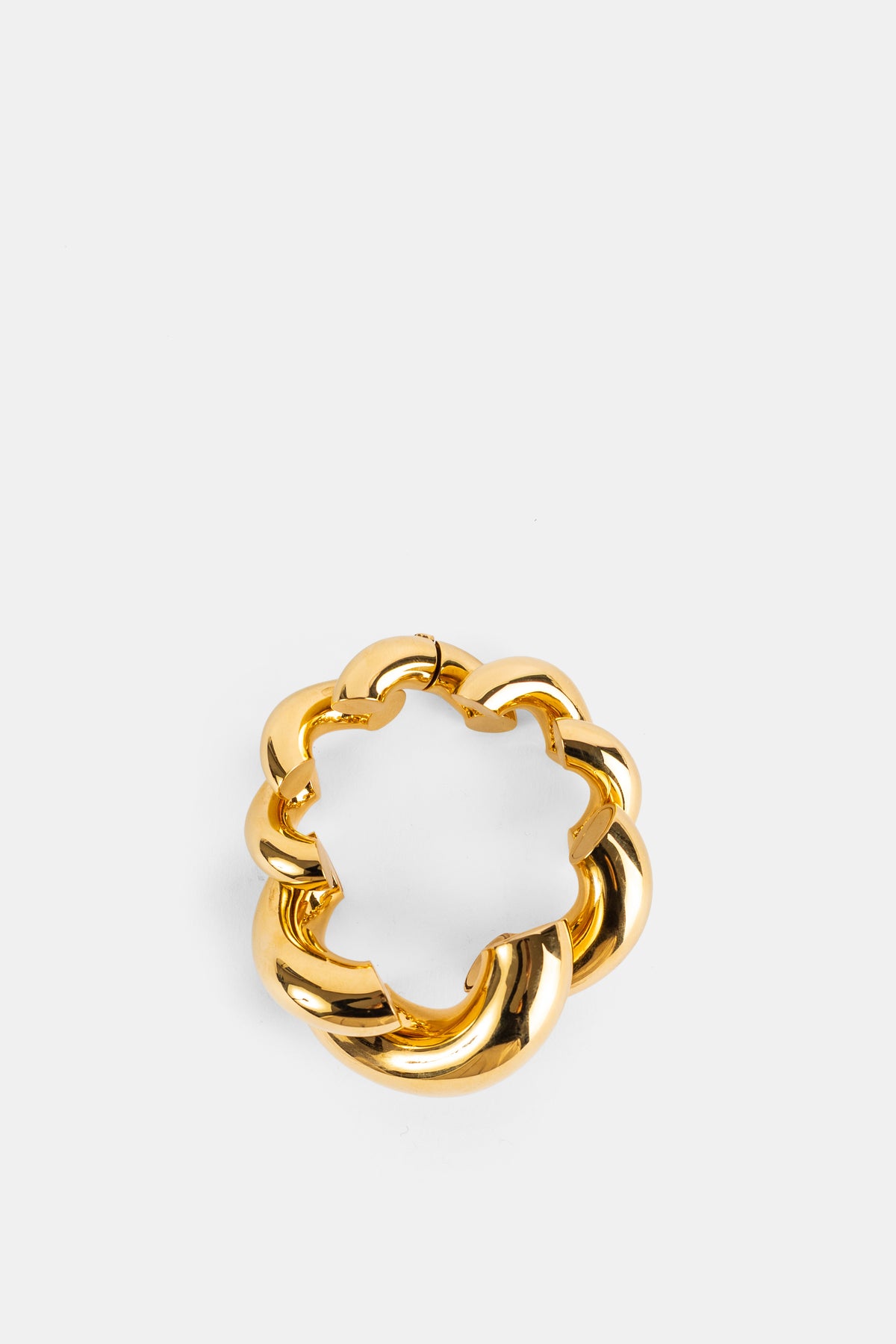 Maison Alaïa bracelet torsion maillons laiton doré poli sculpture bijou femme or SS26