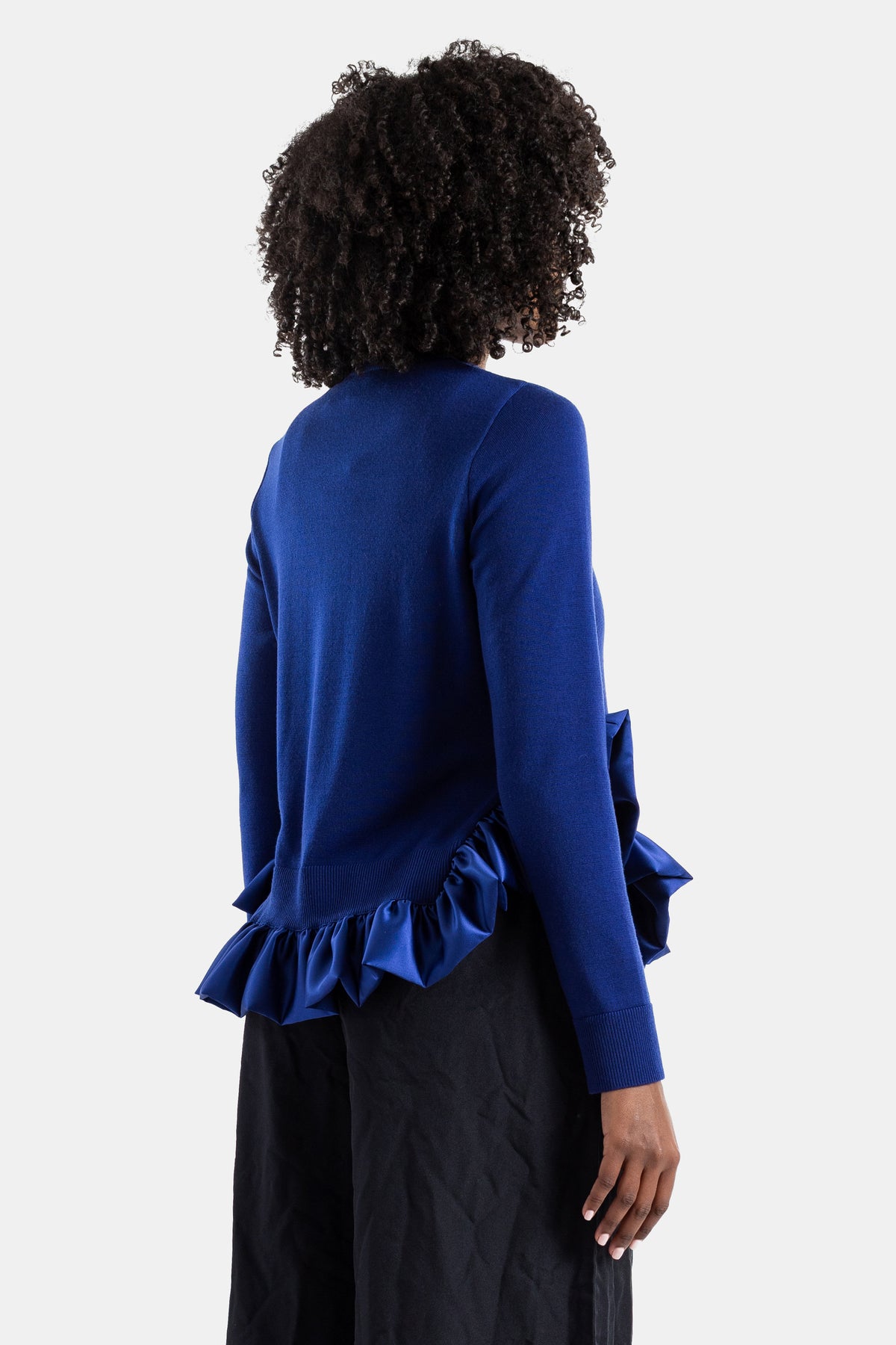Blue knit cardigan with satin ruffles