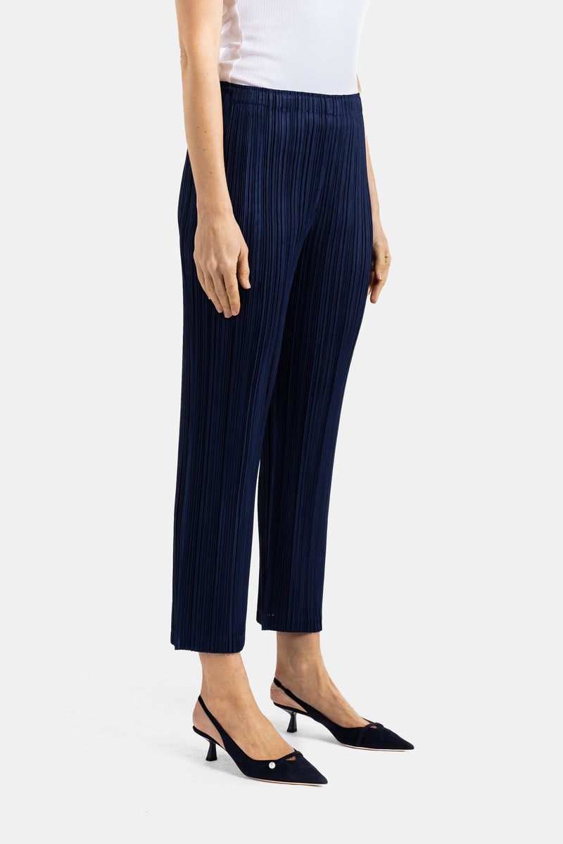 Straight pleated ankle-length trousers