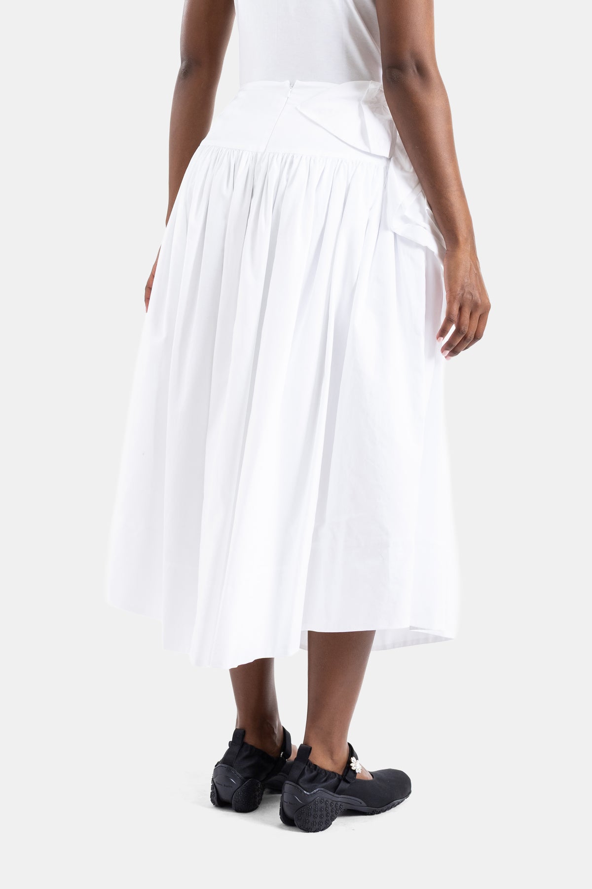 White poplin peplum skirt with rosette