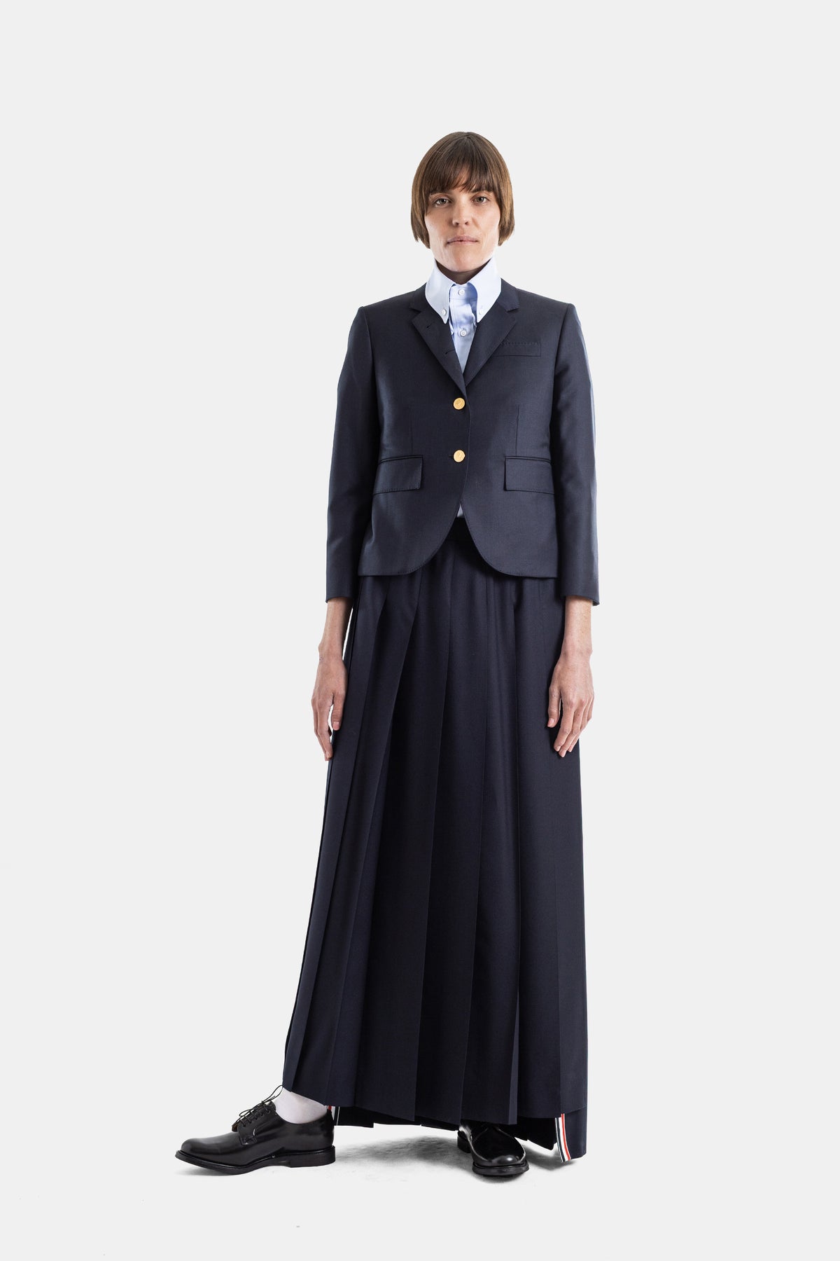Jupe longue plissée en twill de laine marine