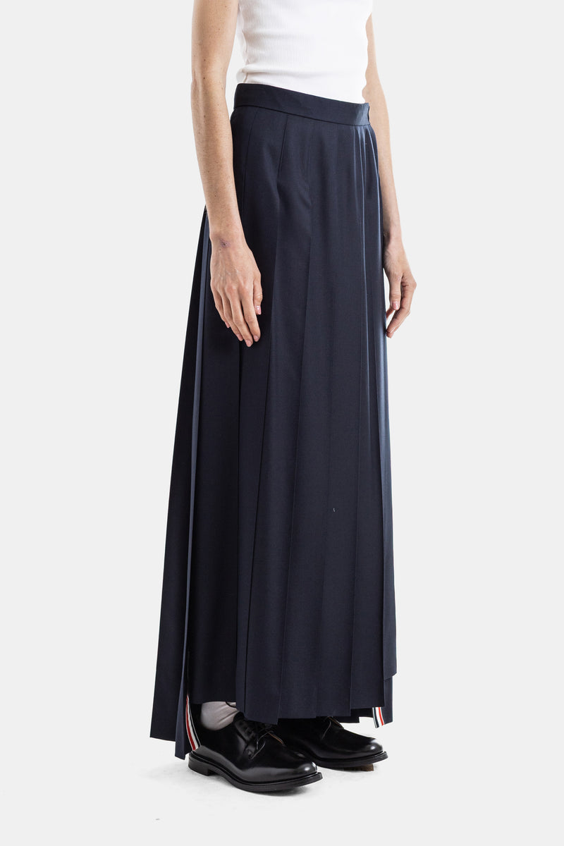 Jupe longue plissée en twill de laine marine