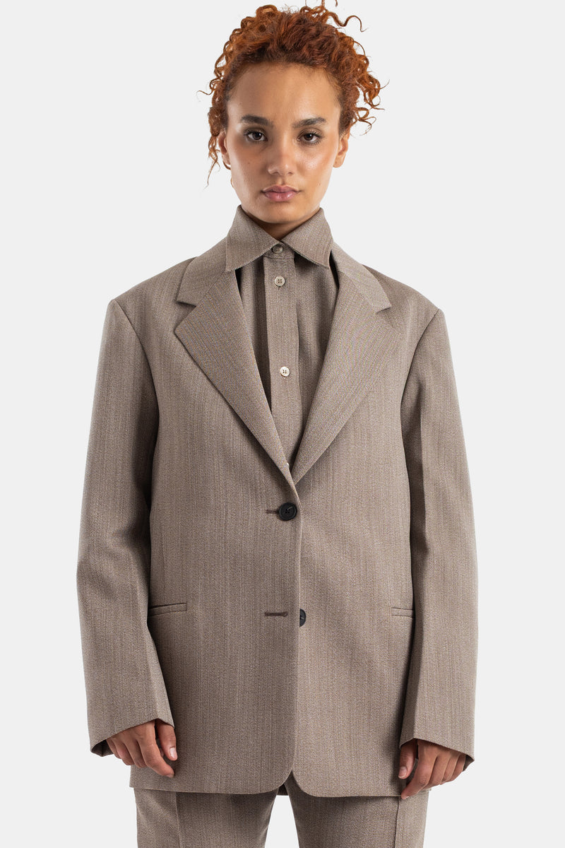 Oversized Studio Nicholson blazer van gemêleerd taupe wol met reverskraag en een gestructureerde pasvorm.