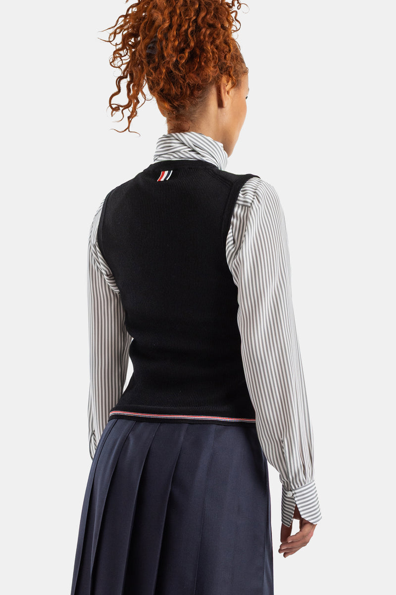 Thom Browne top côtelé noir dos vue arrière badge tricolore RWB superposé chemise col roulé rayée femme