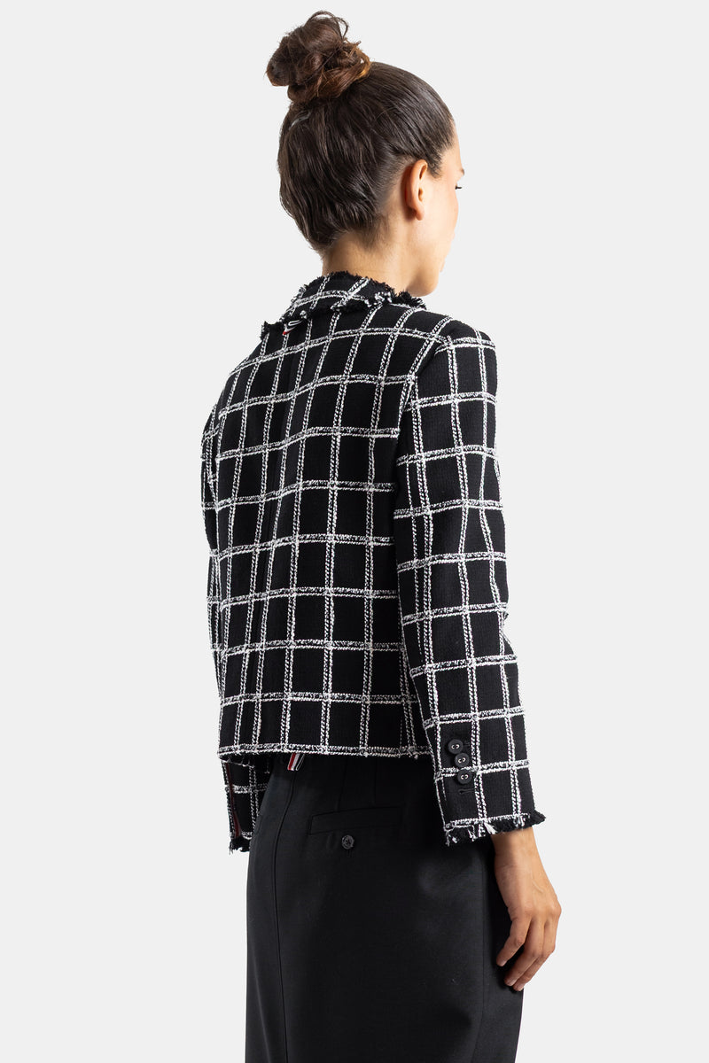 Thom Browne veste tweed carreaux dos vue arrière tissage bouclé noir blanc boutons manchette